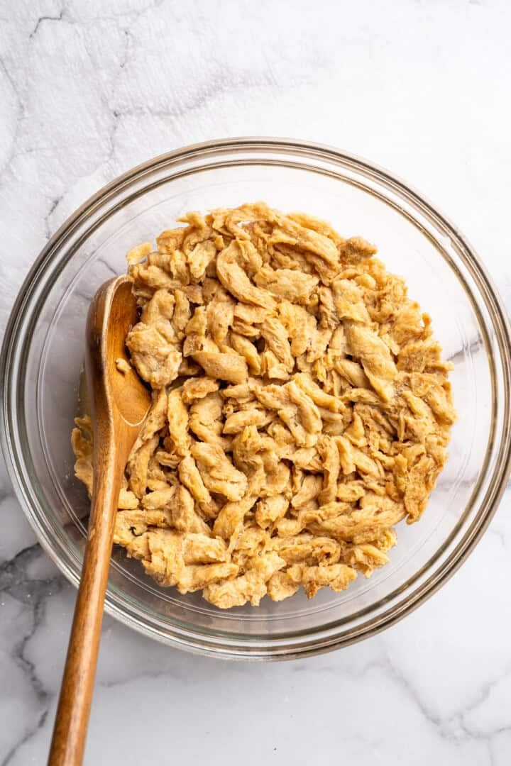 Soy curls hydrated in broth.