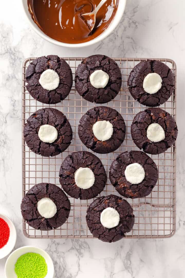 Hot chocolate cookies cooling on wire rack.
