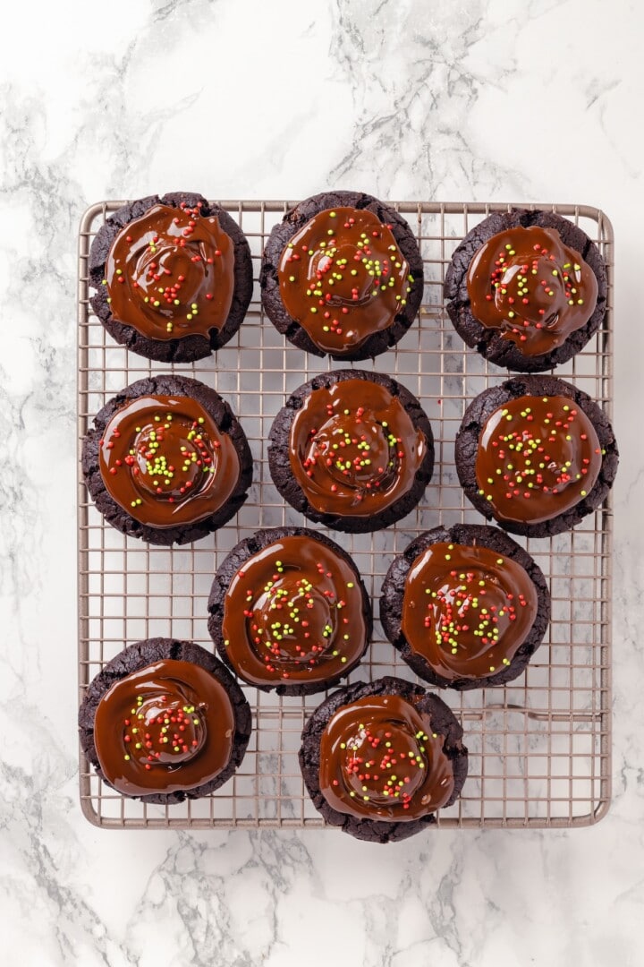 Hot chocolate cookies on wire rack.