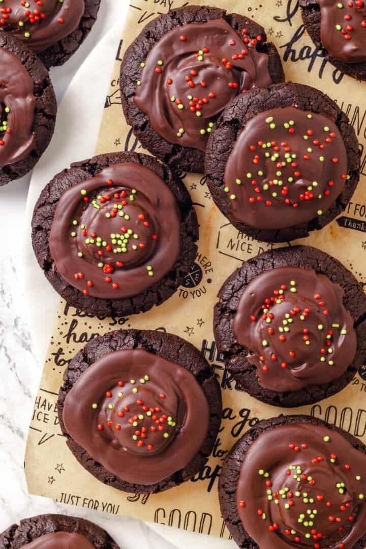 Hot chocolate cookies on platter and countertop.