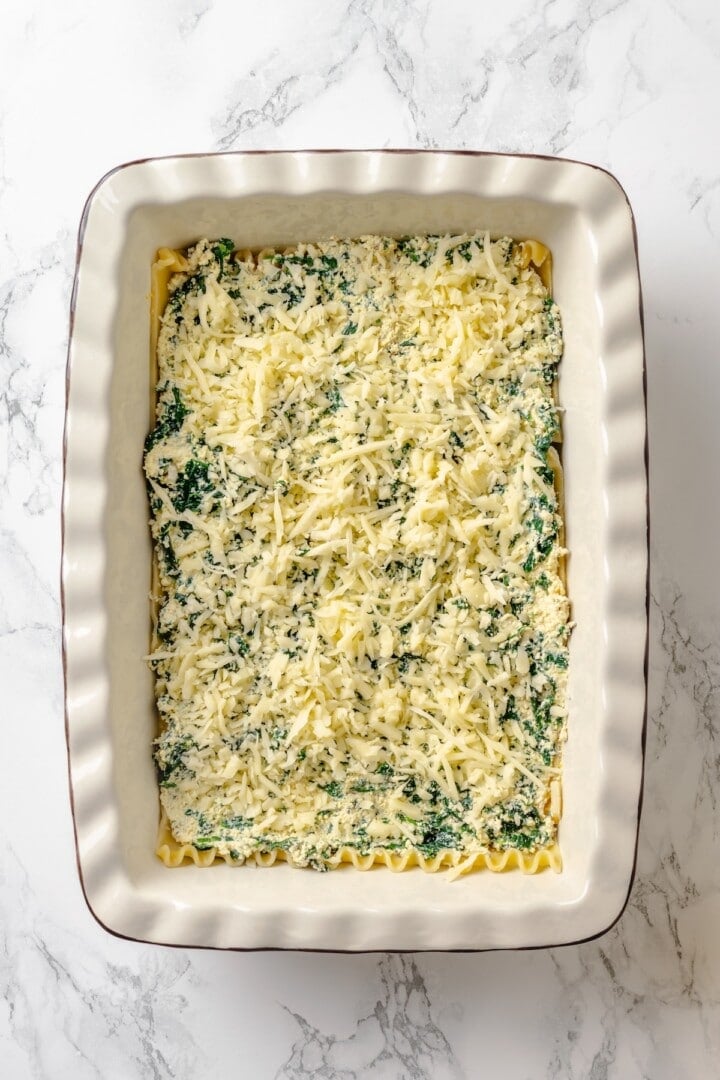 With layers of creamy squash, spinach ricotta and vegan cheese, this butternut squash lasagna is hearty, rich and full of cozy fall flavour! Spinach and cheese layer for lasagna.