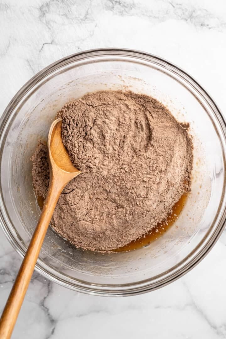 Dry ingredients added to bowl of wet ingredients.