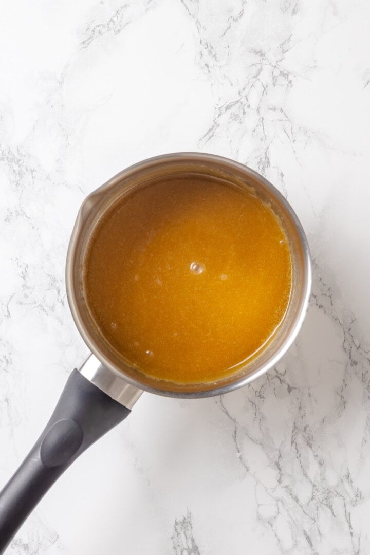 Soft, gooey and sticky, this Vegan Monkey Bread recipe is an irresistible pull-apart treat that's perfect for weekend brunches and holidays! Caramel mixture for monkey bread.
