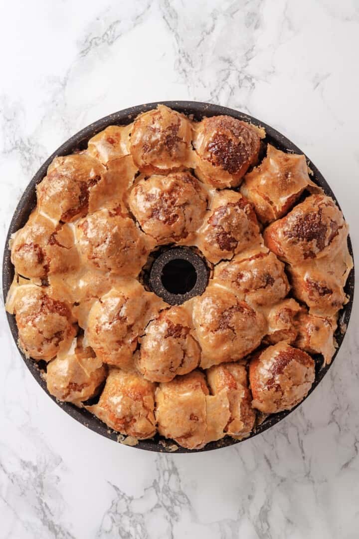 Soft, gooey and sticky, this Vegan Monkey Bread recipe is an irresistible pull-apart treat that's perfect for weekend brunches and holidays! Monkey bread in bundt pan.