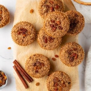 Overhead view of vegan bran muffins on cutting board.
