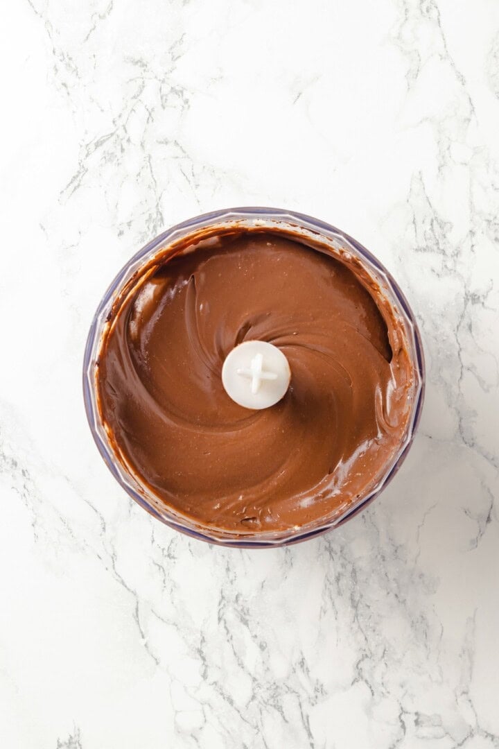 Silken Tofu Chocolate Mousse is the easiest vegan dessert you'll ever make! It's rich and indulgent, with a velvety smooth texture. So good! Silken tofu chocolate mousse in food processor.