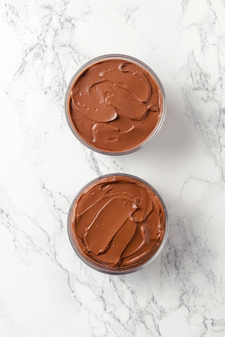 Silken Tofu Chocolate Mousse is the easiest vegan dessert you'll ever make! It's rich and indulgent, with a velvety smooth texture. So good! Two bowls of silken tofu chocolate mousse.