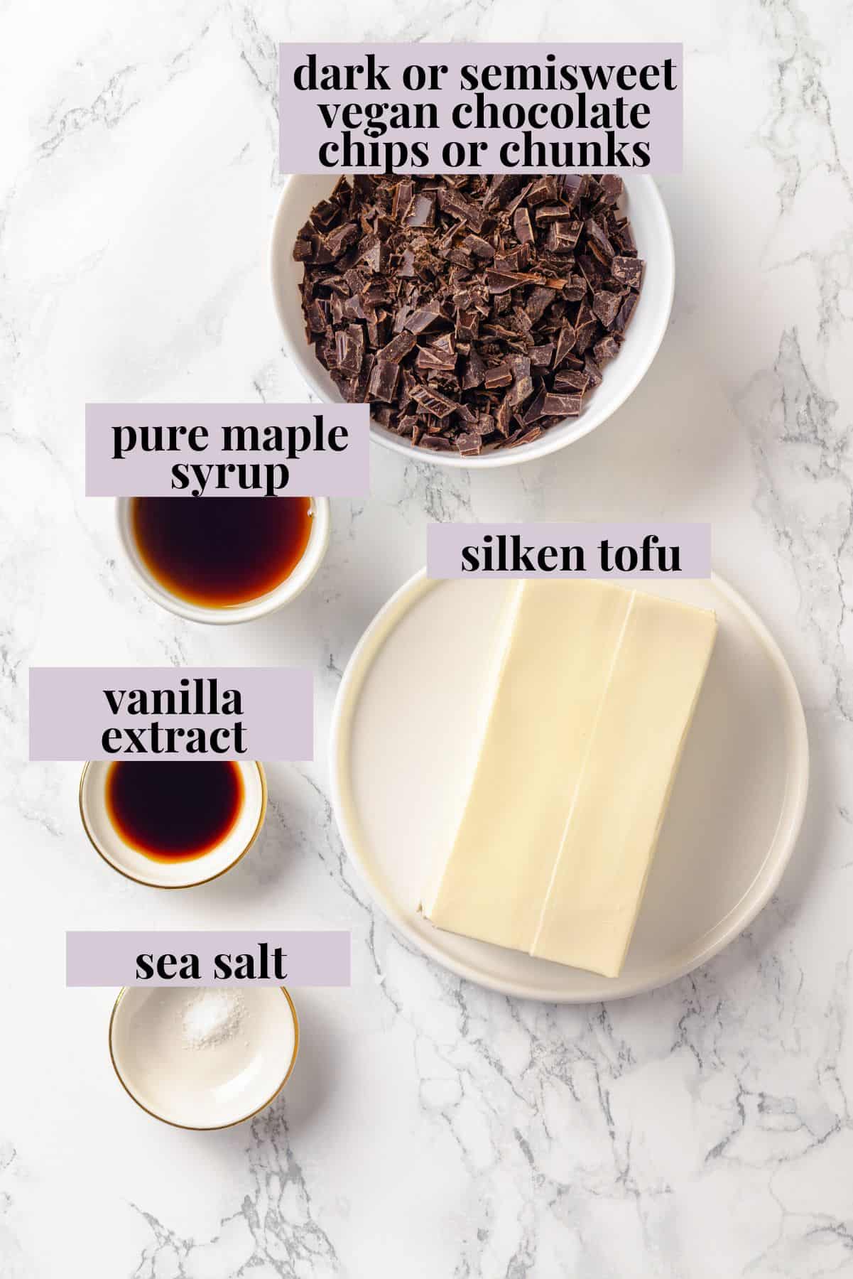 Silken Tofu Chocolate Mousse is the easiest vegan dessert you'll ever make! It's rich and indulgent, with a velvety smooth texture. So good! Ingredients for silken tofu chocolate mousse with labels.