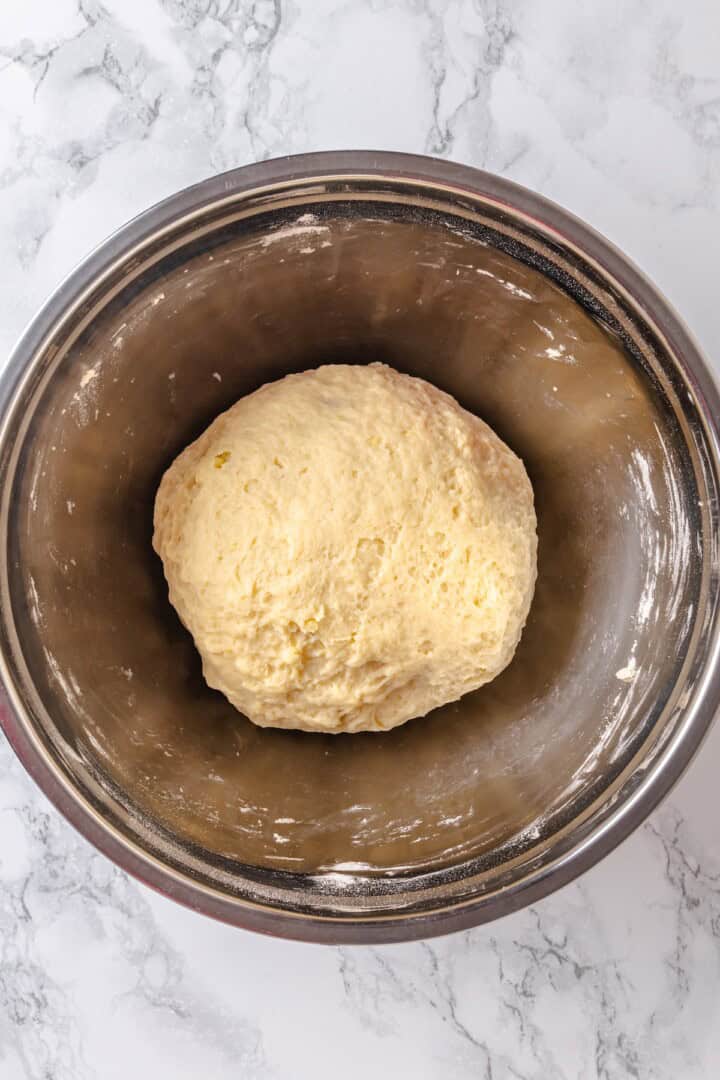 Bowl with Moravian sugar cake before rising. - 10