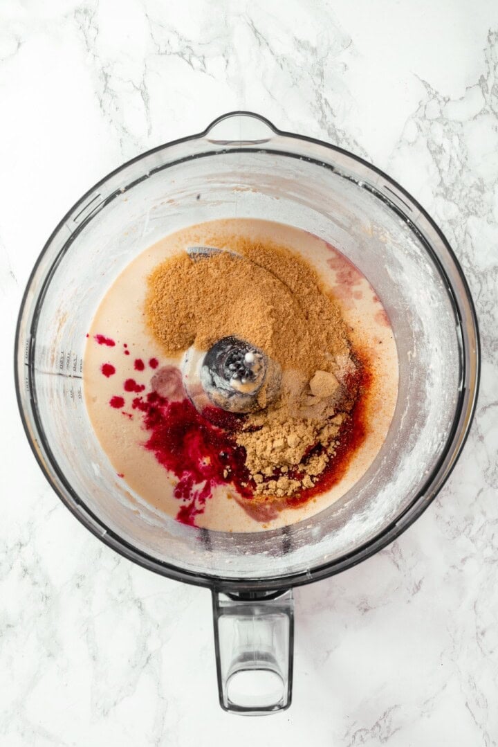 This easy vegan salami recipe is smoky, savoury and sliceable, just like the real deal! Perfect for sandwiches and charcuterie boards. Ingredients for red base for vegan salami in food processor.