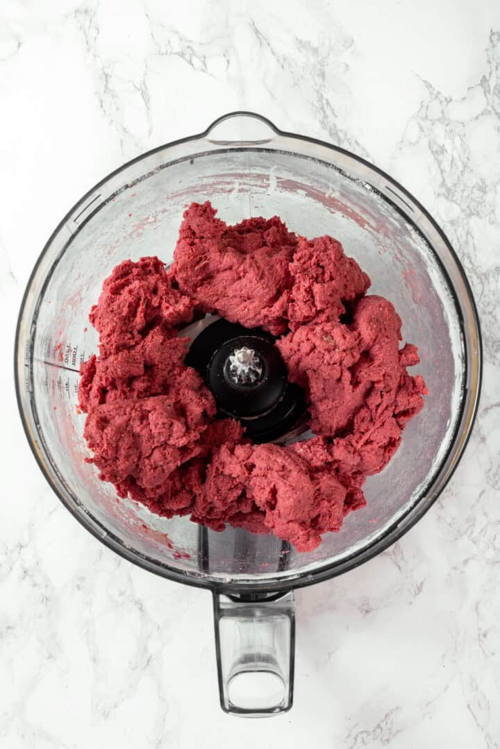 This easy vegan salami recipe is smoky, savoury and sliceable, just like the real deal! Perfect for sandwiches and charcuterie boards. Red salami dough in food processor.