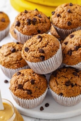 Stack of peanut butter banana muffins.