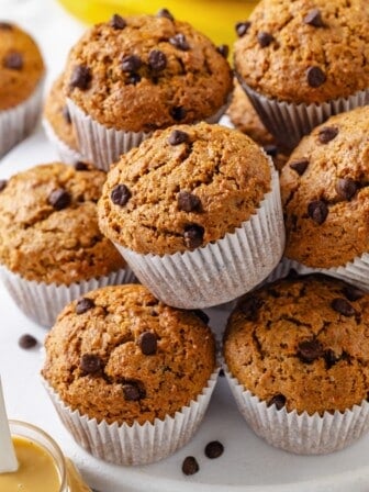 Stack of peanut butter banana muffins.