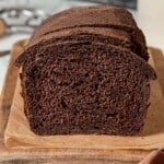 Sliced loaf of pumpernickel bread.