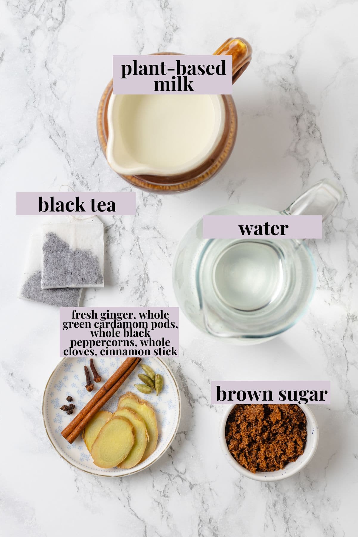 This cozy vegan spiced chai chai is creamy, warmly spiced, and easy to make at home with oat milk and whole spices. Ingredients for spiced chai with labels.