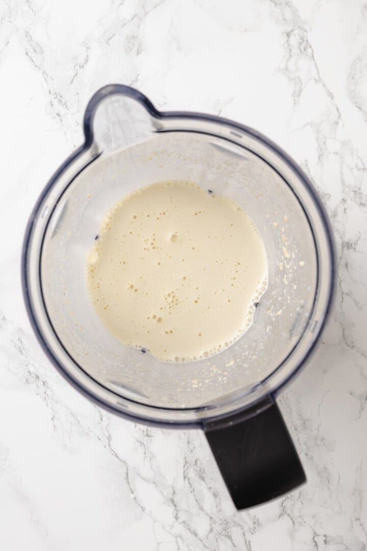This homemade mushroom ravioli is filled with porcini, cremini and ricotta, then tossed in a creamy vegan Parmesan sauce. Restaurant-worthy! Creamy cashew sauce in blender.