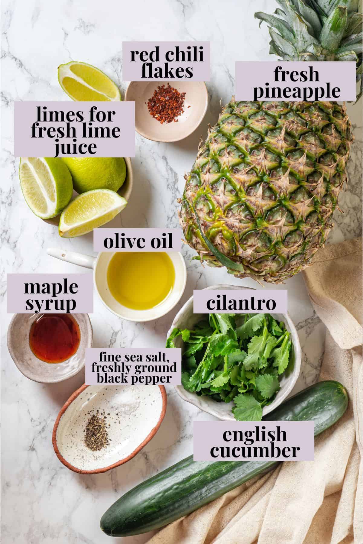 This easy pineapple cucumber salad is crisp, juicy and tossed in a tangy lime dressing. It’s refreshing, quick and perfect for summer! Ingredients for pineapple cucumber salad with labels.