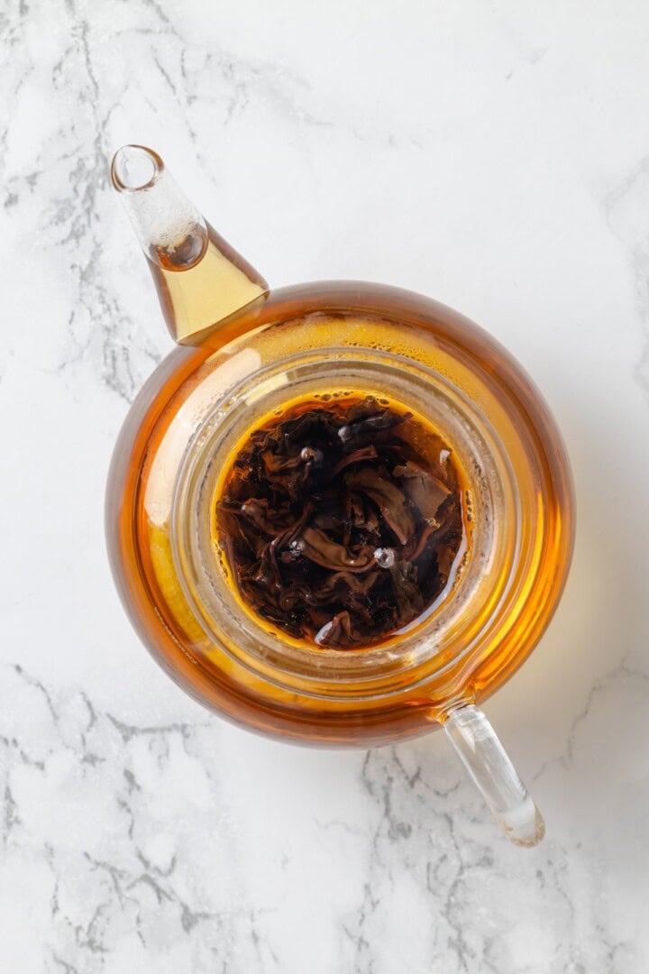 This cozy London Fog recipe blends fragrant Earl Grey tea, vanilla and creamy vegan milk into a sweet café-style latte you can make at home! Tea kettle with Earl Grey tea.