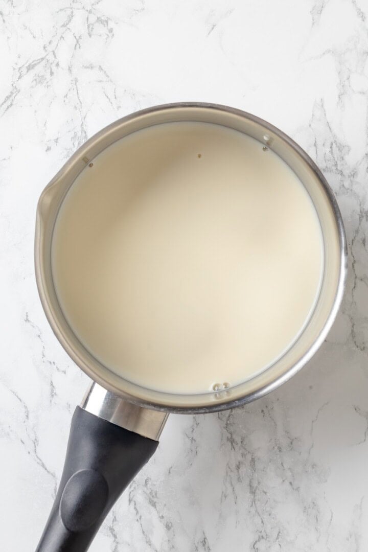 This cozy London Fog recipe blends fragrant Earl Grey tea, vanilla and creamy vegan milk into a sweet café-style latte you can make at home! Pan of vegan milk.