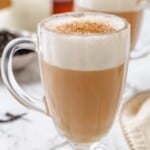 London fog latte in glass mug.