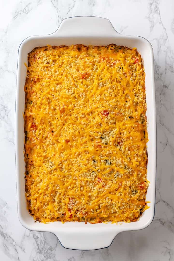 Baking dish with loaded hashbrown casserole.