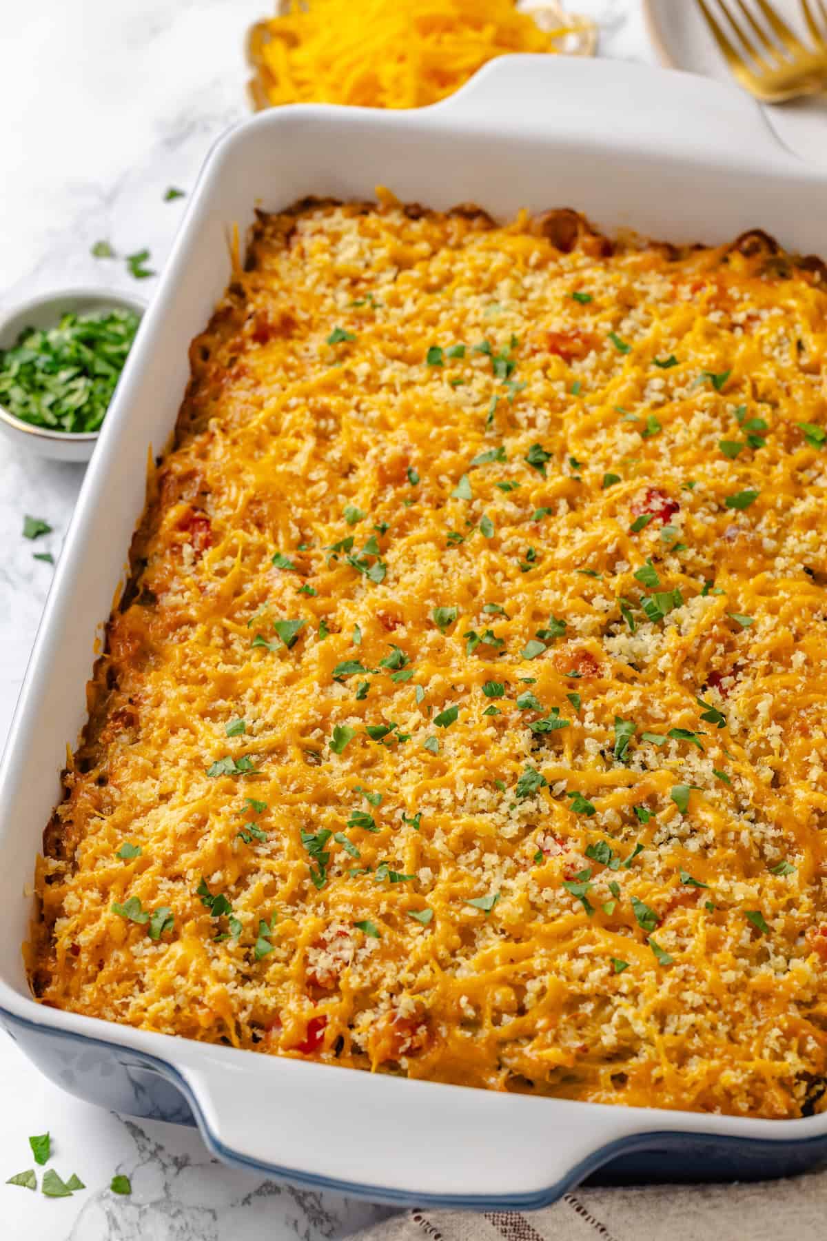 Loaded hashbrown casserole in baking dish.
