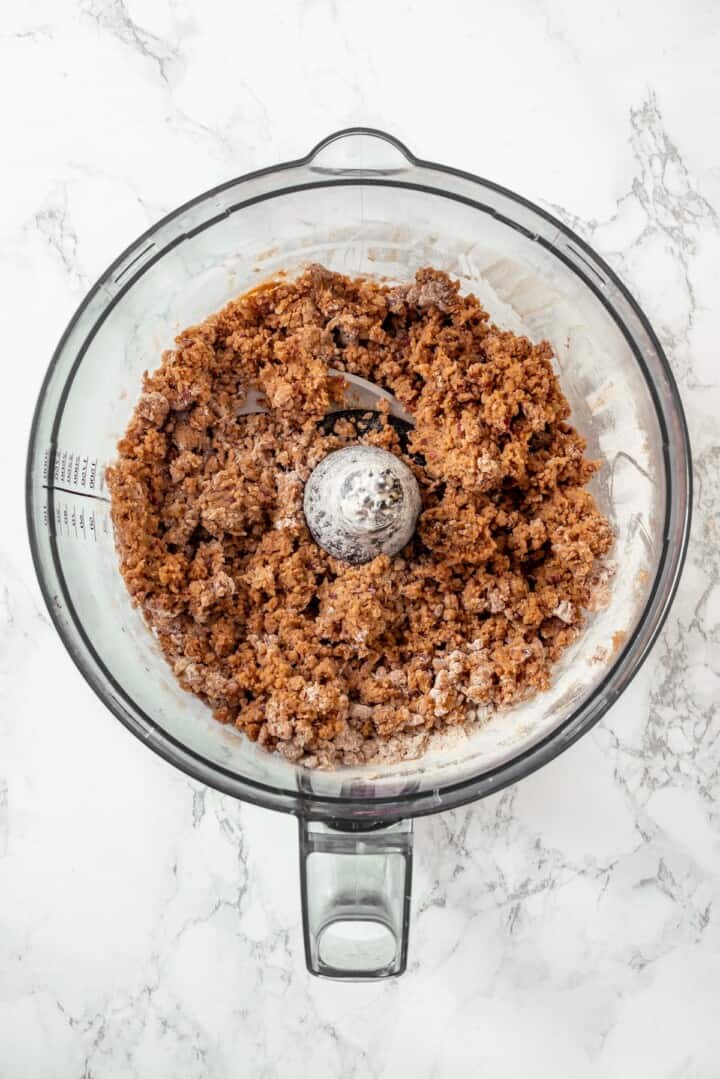 Savory, hearty and full of umami flavor, this homemade vegan steak is made with seitan for a protein-packed plant-based main dish! Seitan mixture in food processor bowl.