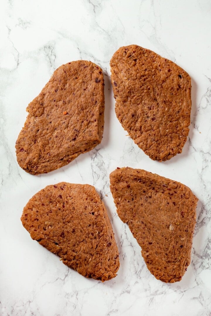 Savory, hearty and full of umami flavor, this homemade vegan steak is made with seitan for a protein-packed plant-based main dish! Shaped vegan steaks.