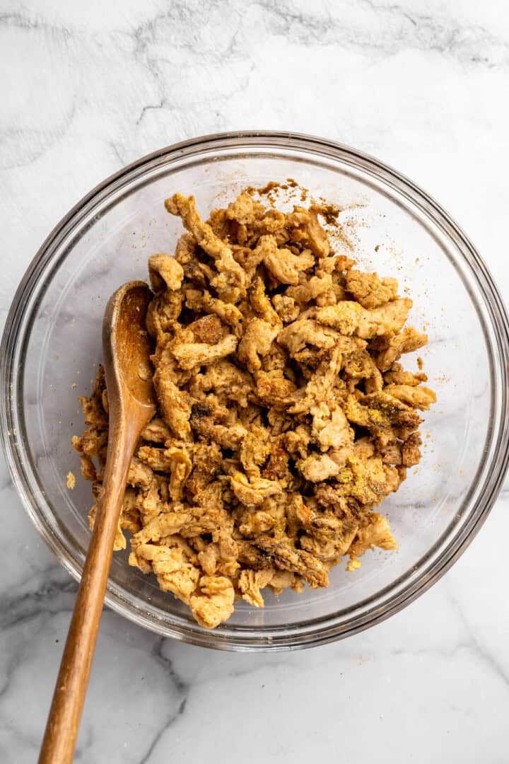 A little bit crispy, budget-friendly and packed with bold flavour, these BBQ soy curls are an easy vegan staple you’ll make again and again! Hydrated soy curls in bowl.