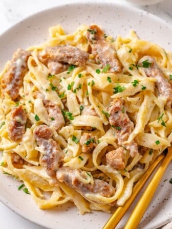 Plate of vegan soy curl chicken alfredo.