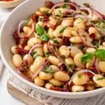 Tuscan-style marinated beans in a serving bowl.