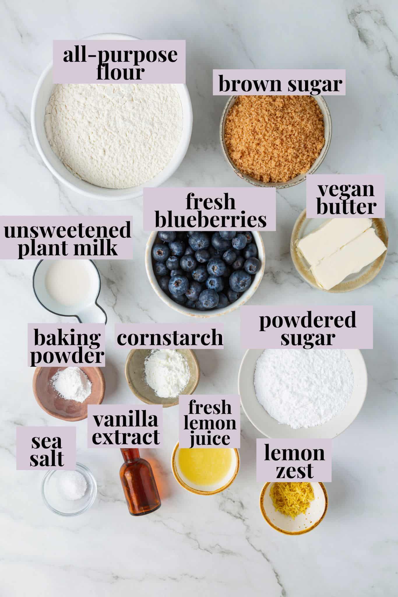 Loaded with jammy pockets of fresh berries and topped with a sweet lemon glaze, these vegan blueberry cookies are a summer must. Labeled ingredients for vegan blueberry cookies.