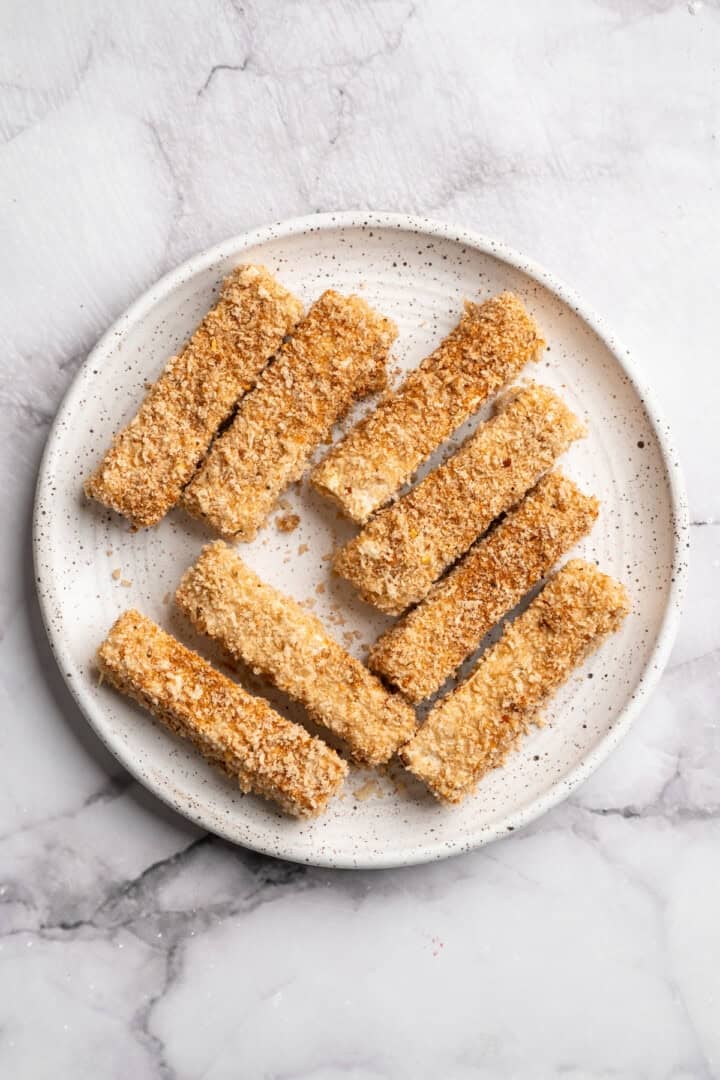 This tofu salad, topped with Cajun fried tofu and creamy, tangy-sweet dressing, is just as good as TGI Friday's version. And it's vegan! Panko crusted tofu strips ready for frying.