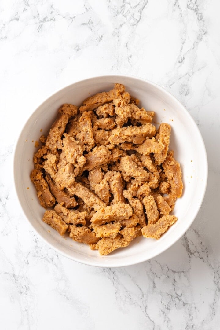 This vegan "chicken" and rice delivers all the cozy, savoury goodness of the meat-eater's version, no chicken required. Drained and gently squeezed soy curls ready for seasoning and searing.