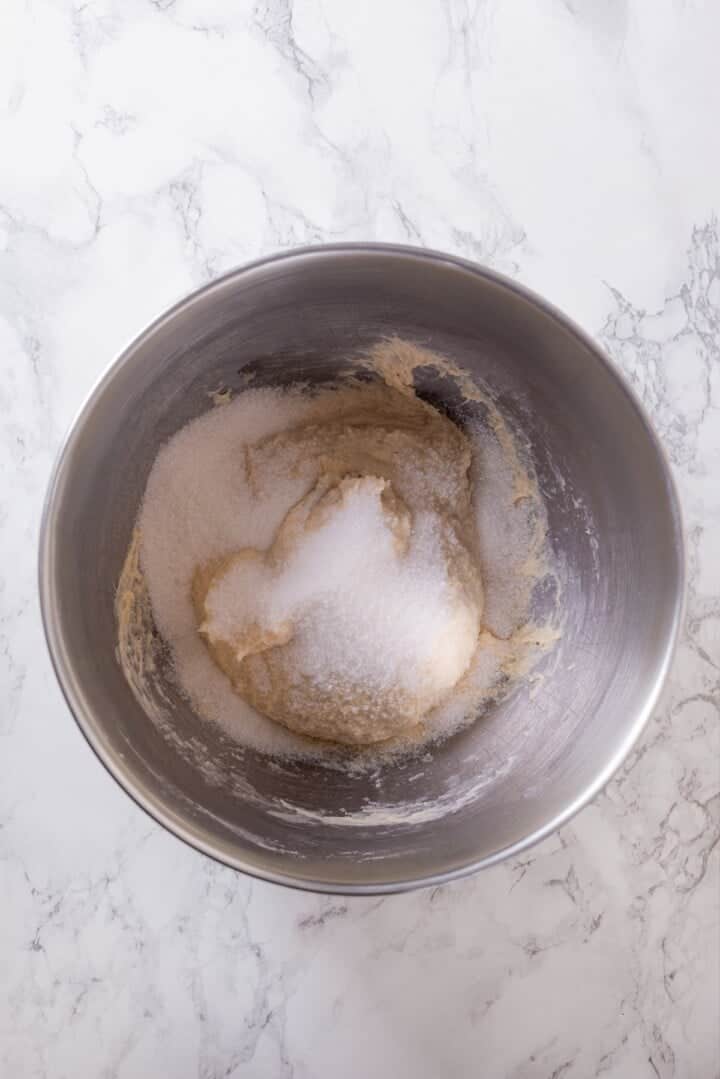 These vegan sourdough cinnamon rolls are impossibly soft, packed with cinnamon sugar filling, and topped with a smooth cream cheese glaze. Adding sugar and salt to a dough of plant milk, coconut cream, active sourdough starter, olive oil, and flour.