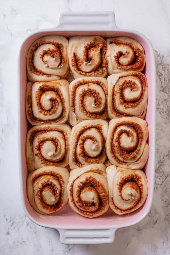 These vegan sourdough cinnamon rolls are impossibly soft, packed with cinnamon sugar filling, and topped with a smooth cream cheese glaze. Vegan sourdough cinnamon rolls ready to go in the oven.