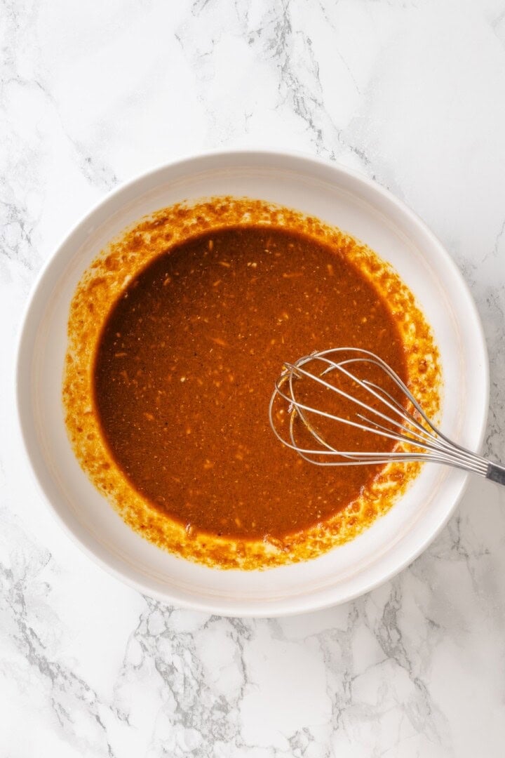 Move over, chicken satay. This tofu satay delivers all the sweet, savoury, tang you crave, with firm caramelised tofu and Thai peanut sauce. Whisking together the marinade for tofu satay.