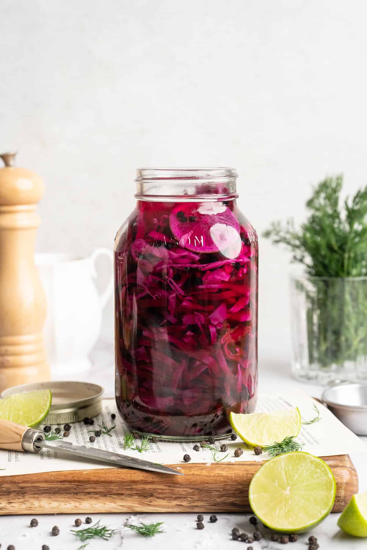 This quick pickled cabbage comes out incredibly flavourful (brine-y, tangy, and a tad sweet) with a subtle crunch. And in just a few minutes! Quick pickled red cabbage in a mason jar.