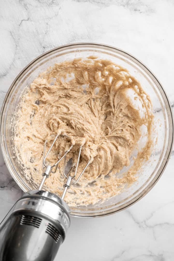 Peanut butter swirl brownies are wonderfully fudge-y, perfectly chewy, and complete with a salty ribbon of peanut butter swirled throughout. Whisking together flax egg, brown sugar, and coconut oil.