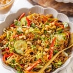 A bowl full of crispy rice and tofu salad.