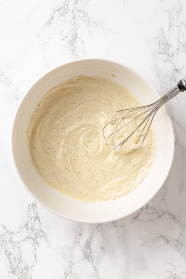 Creamy and crunchy, this macaroni salad recipe is made with crumbled tofu and a touch of kala namak for that old-school eggy flavor. Whisking together the dressing for vegan mac salad.