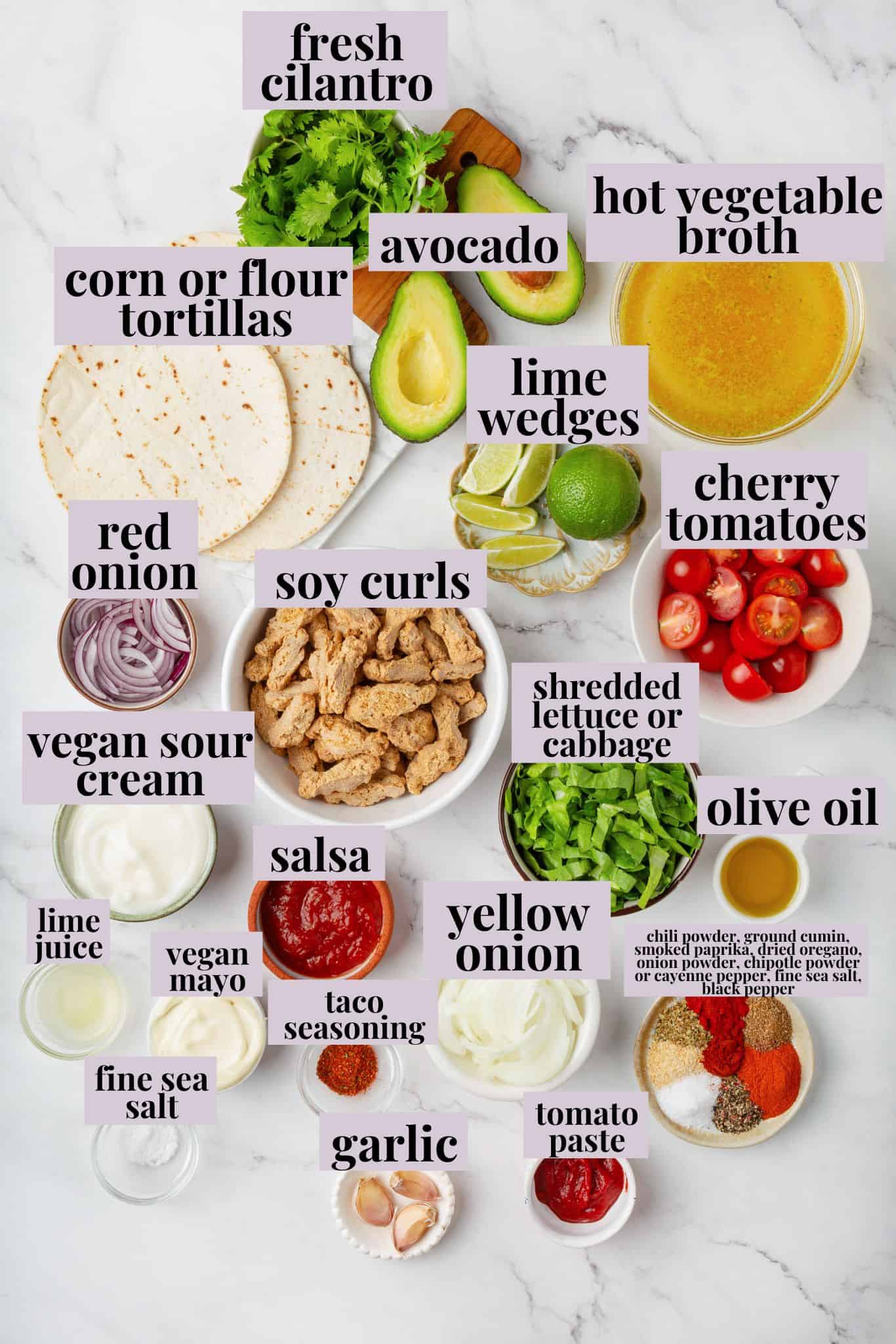 These vegan soy curl tacos pair perfectly crispy soy curl "chicken" with classic taco toppings and the BEST tangy, creamy lime sauce. Labeled ingredients for soy curl tacos.