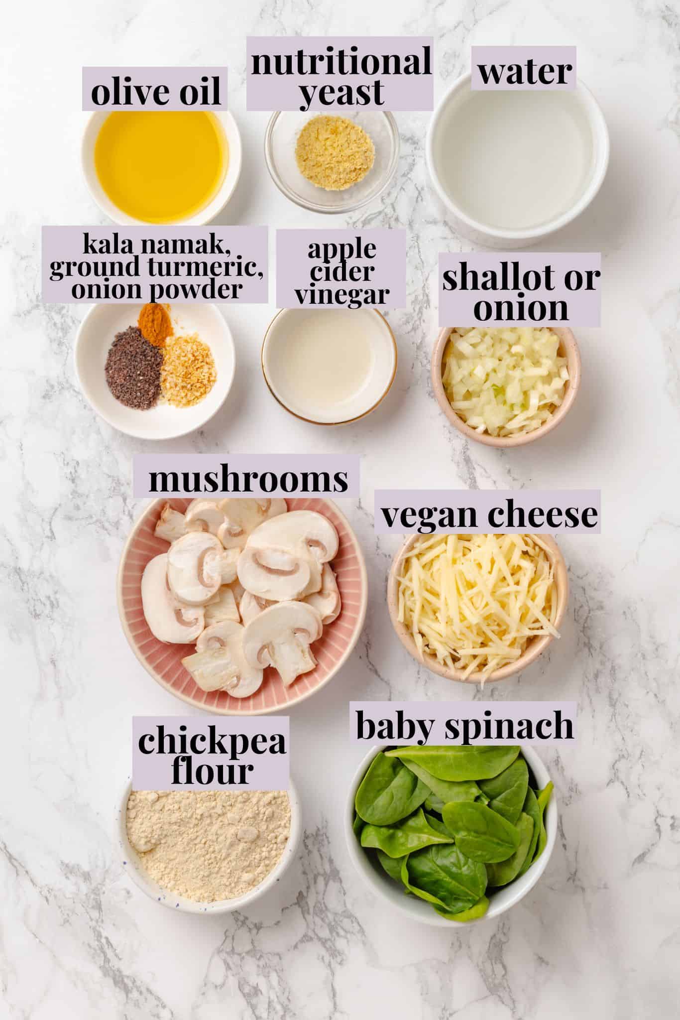 Start today right with this vegan omelette! Chickpea flour and water combine to make a tender omelette filled with veggies and vegan cheese. Labeled ingredients for chickpea flour omelette.