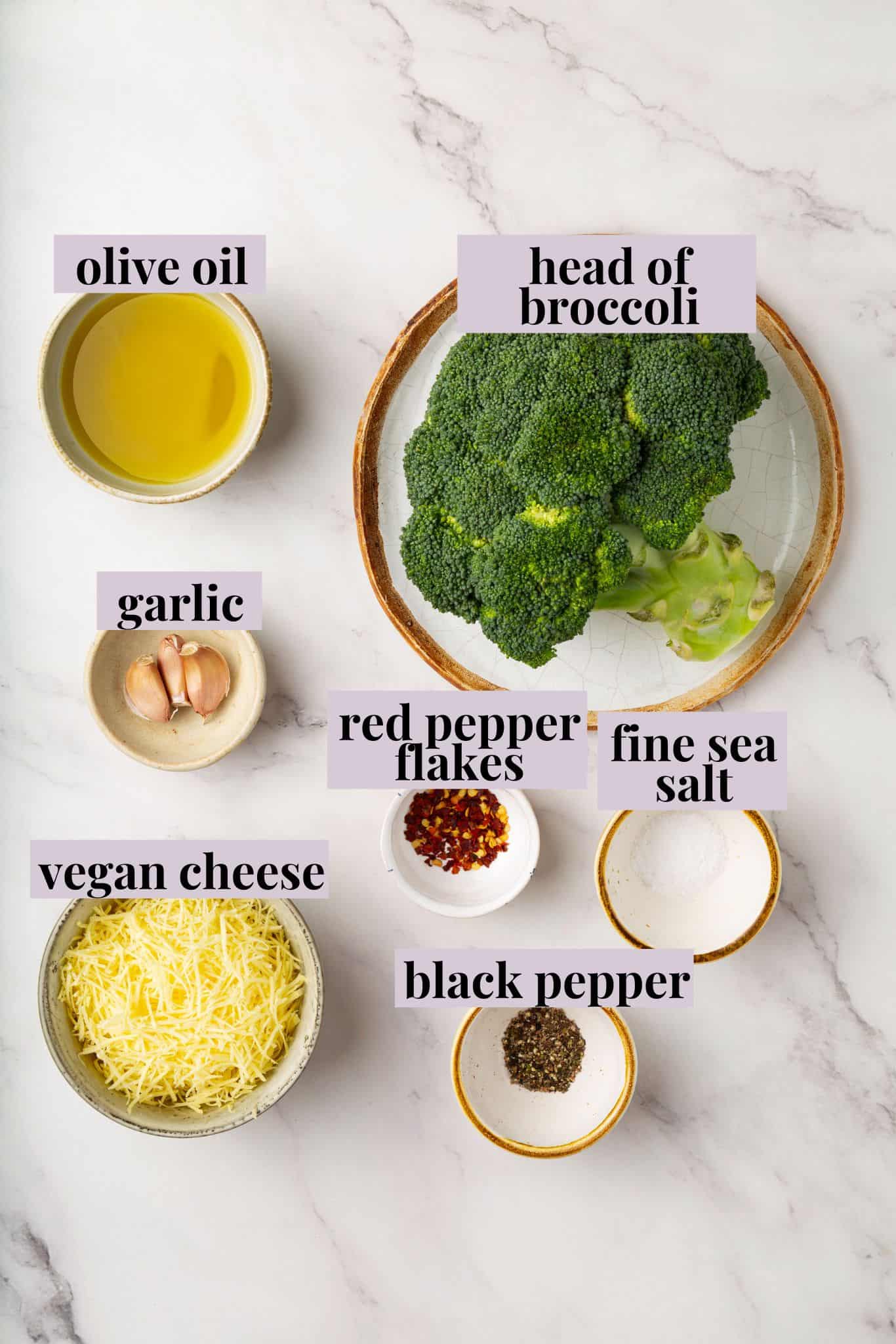 Cheesy vegan smashed broccoli is the perfect way to mix up your veggie routine. Served with a creamy garlic sauce, it's sure to impress. Labeled ingredients for smashed broccoli recipe.