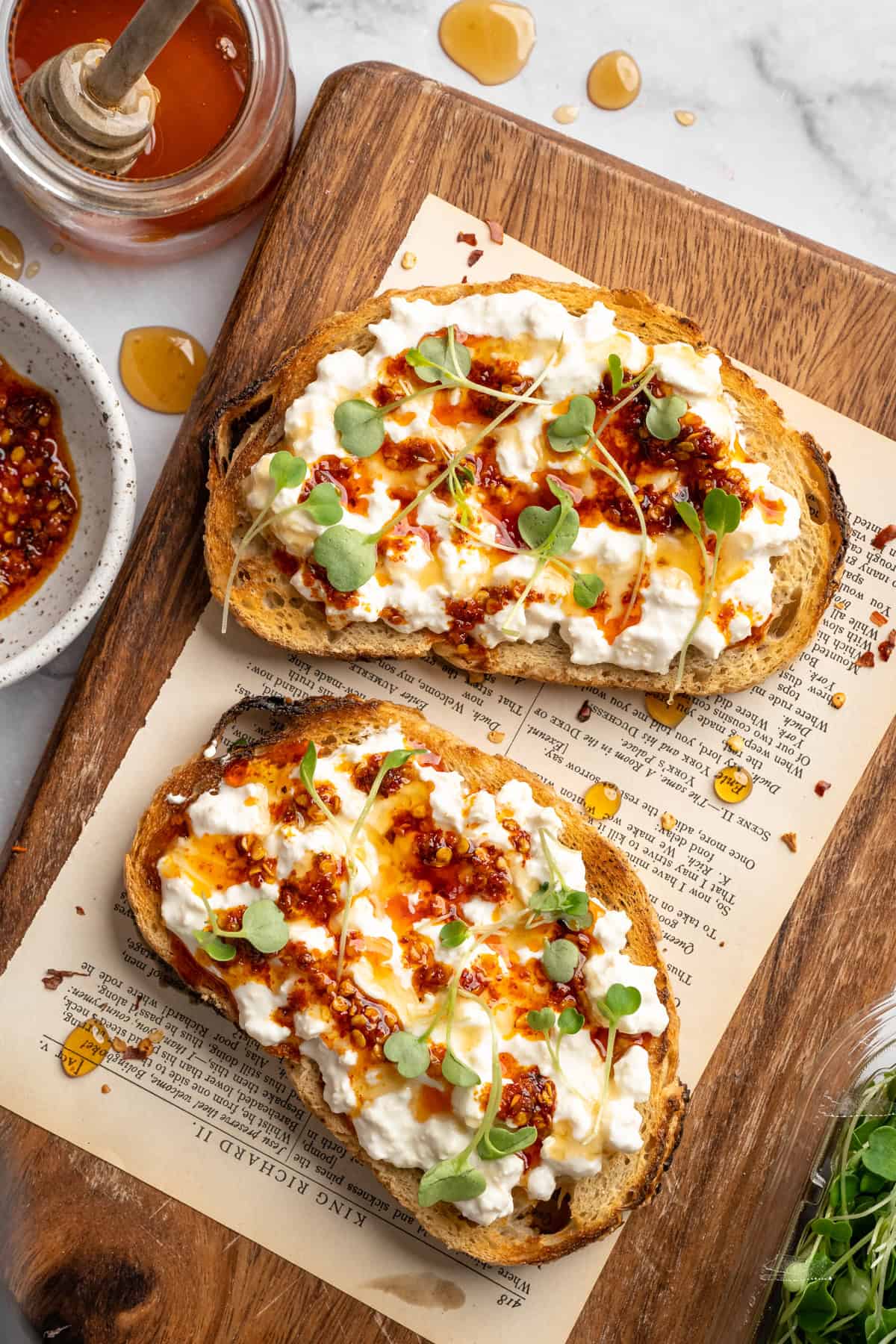 This vegan cottage cheese recipe marinates perfectly tender tofu "curds" in a savoury, tangy, salty sauce. It's a vegan staple you need! Tofu cottage cheese on toast.