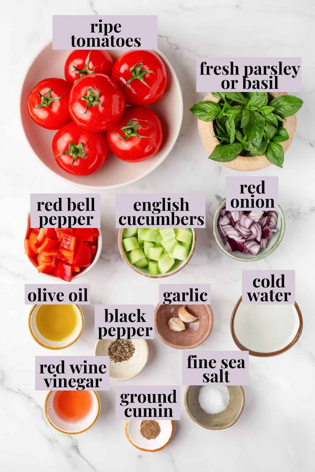 This gazpacho recipe blends farmers' market tomatoes with fresh veggies, olive oil, and vinegar for the perfect sweet 'n tangy summer soup. Labeled ingredients for easy gazpacho recipe.