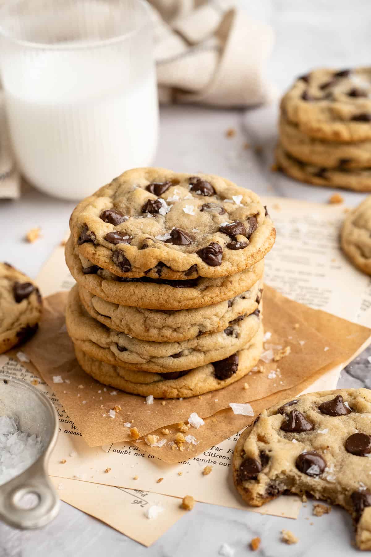 These vegan sourdough chocolate chip cookies are about to up your cookie standards. They're tender and chewy with a subtle sourdough tang. A stack of sourdough chocolate chip cookies.
