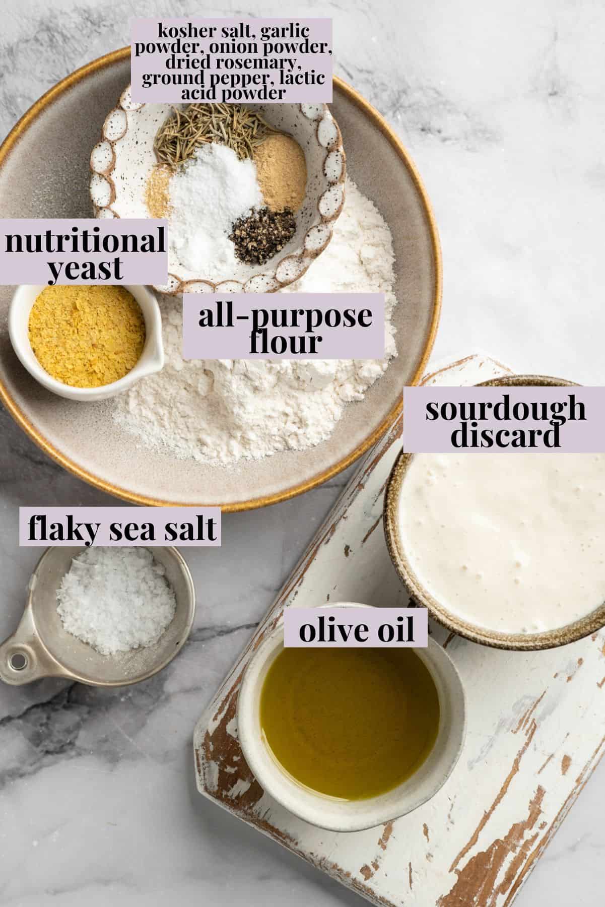 What to do with that sourdough discard? These easy sourdough discard crackers are crunchy, crispy, and flaky, with that best sourdough tang. Labeled ingredients for sourdough discard crackers recipe.