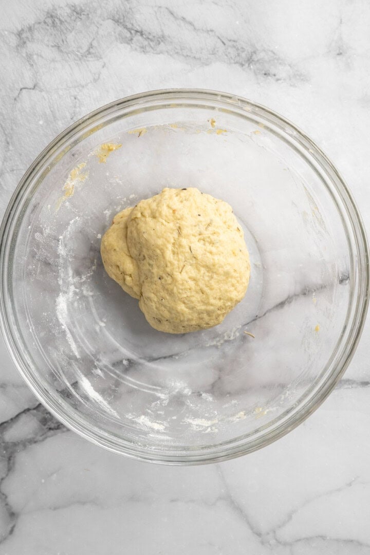 What to do with that sourdough discard? These easy sourdough discard crackers are crunchy, crispy, and flaky, with that best sourdough tang. Sourdough discard cracker dough in a bowl.