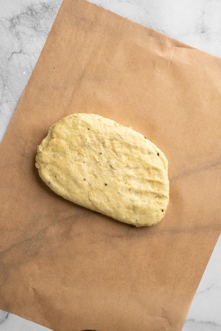 What to do with that sourdough discard? These easy sourdough discard crackers are crunchy, crispy, and flaky, with that best sourdough tang. Repeatedly folding sourdough discard cracker dough over and onto itself.